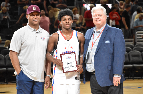 Lan Haywood of Kolache Factory West in Carmel (left) and All-Star games director Mike Broughton (right) with 2023 boys' game MVP, Markus Burton of Penn.