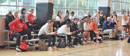 A group of college coaches watches the action during a game between Homestead and Zionsville in the first IBCA/IHSAA Girls' Team Showcase on June 16 at Mt. Vernon (Fortville).