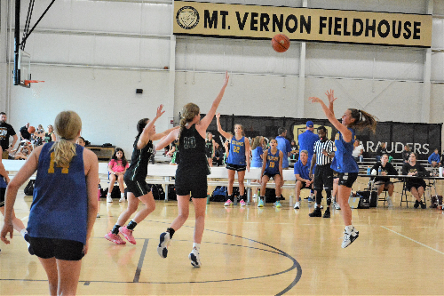 A Homestead player shoots from 3-point range during the Spartans' game against Zionsville in the first IBCA/IHSAA Girls' Team Showcase on June 16 at Mt. Vernon (Fortville).