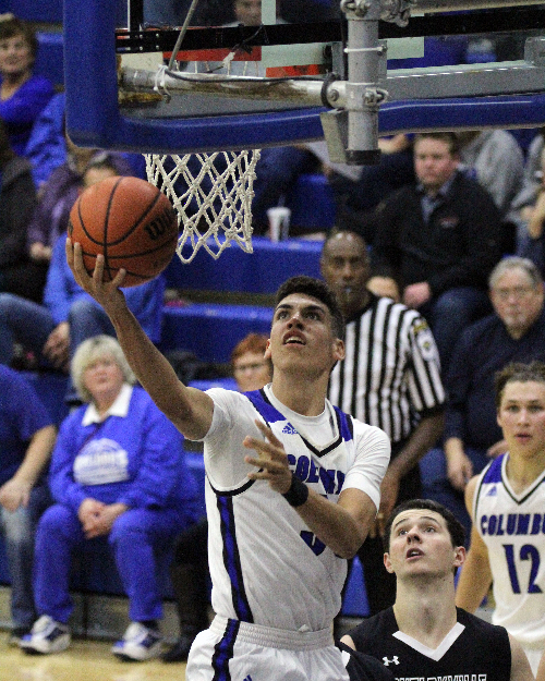 A Columbus North player elevates for a shot near the rim during a past season. Virtually all coaches (and players) would like such high percentage opportunities during the 2025 state tournament series.