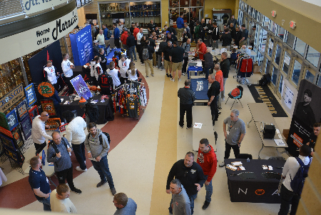 IBCA-member coaches interact with a number of IBCA corporate partners in the vendor area of the 2024 IBCA Clinic at Mt. Vernon High School in Fortville, Ind. Member coaches are encouraged to work with IBCA corporate partners whenever they can do so.