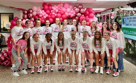 Members of the Triton Central girls basketball program pose on the day of their annual 