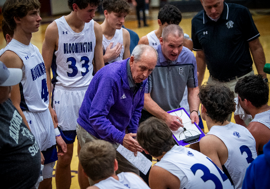 Bloomington South coach J.R. Holmes provides instruction to his team in a timeout during a game against Terre Haute North on Dec. 15, 2023. Holmes won his 900th career victory in that game. Bloomington Herald-Times photo by Rich Janzaruk.