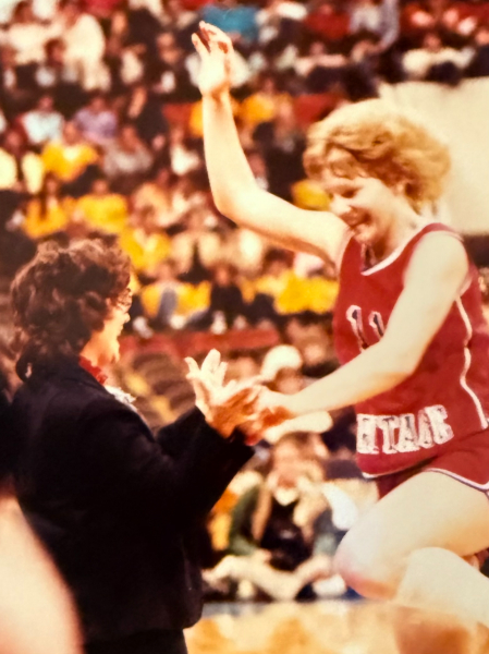 Heritage coach Cheri Gilbert, left, and star player Jody Beerman celebrate the winning moment in the 1982 girls' State Finals.